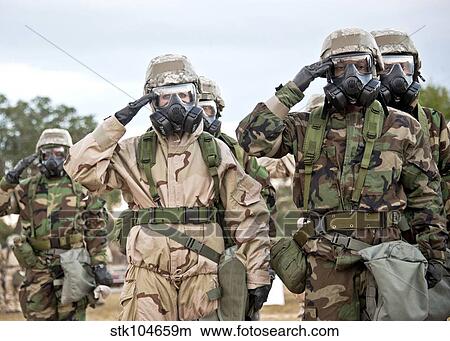 Sailors dressed in full mission oriented protective posture suits. View Large Photo Image Picture - Sailors dressed in full mission oriented protective posture suits.. Fotosearch