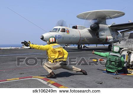 Sailors launch an E-2C Hawkeye aboard USS Dwight D. Eisenhower. View Large Photo Image Picture - Sailors launch an E-2C Hawkeye aboard USS Dwight D. Eisenhower.. Fotosearch