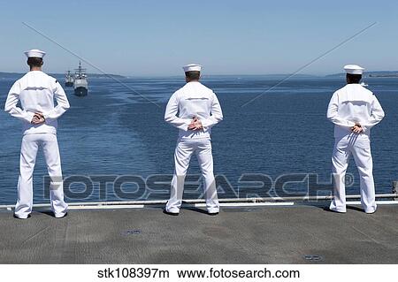 Sailors man the rails aboard USS Essex. View Large Photo Image Picture - Sailors man the rails aboard USS Essex.. Fotosearch
