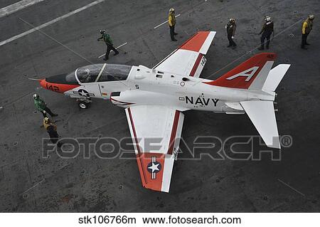 Sailors perform pre-flight checks on a T-45C Goshawk. View Large Photo Image Picture - Sailors perform pre-flight checks on a T-45C Goshawk.. Fotosearch