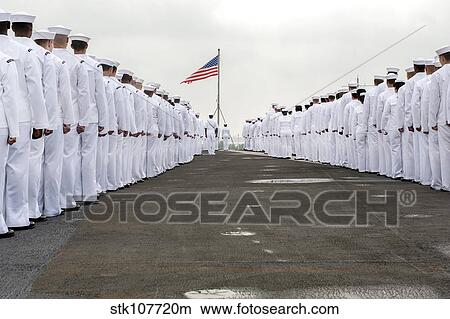Sailors prepare to man the rails on the flight deck of USS Harry S. Truman. View Large Photo Image Picture - Sailors prepare to man the rails on the flight deck of USS Harry S. Truman.. Fotosearch