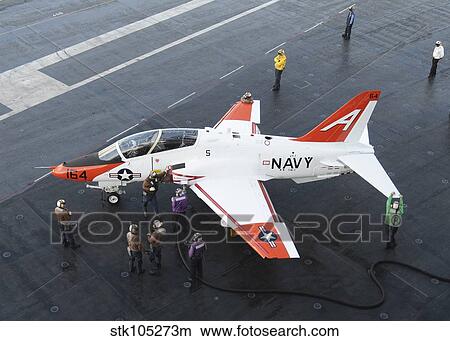 Sailors refuel a T-45 Goshawk on the flight deck of USS George H. W. Bush. View Large Photo Image Picture - Sailors refuel a T-45 Goshawk on the flight deck of USS George H. W. Bush.. Fotosearch