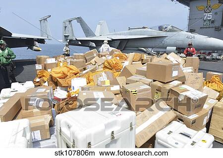 Sailors stage mail to be moved to the hangar bay. View Large Photo Image Picture - Sailors stage mail to be moved to the hangar bay.. Fotosearch