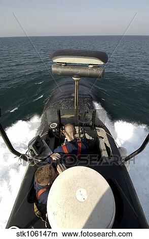 Picture - Sailors stand watch from the bridge of USS Toldeo.. Fotosearch