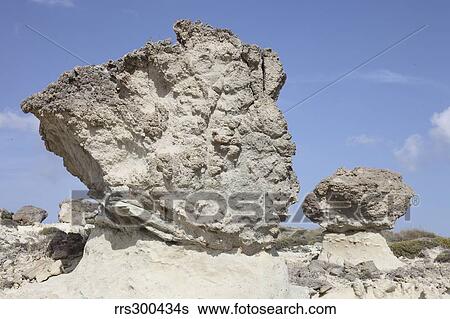 Stock Photograph - Sarakiniko white tuff formations, Milos, Greece.. Fotosearch