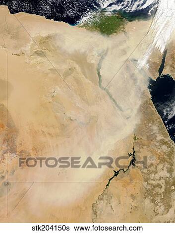 Stock Photograph - Satellite view of a dust storm stretching from Sudan toward Egypt.. Fotosearch