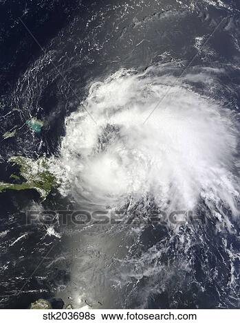 Stock Photograph - Satellite view of Hurricane Irene over the Dominican Republic and Puerto Rico.. Fotosearch