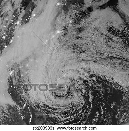 Stock Photograph - Satellite view of Hurricane Sandy at night.. Fotosearch