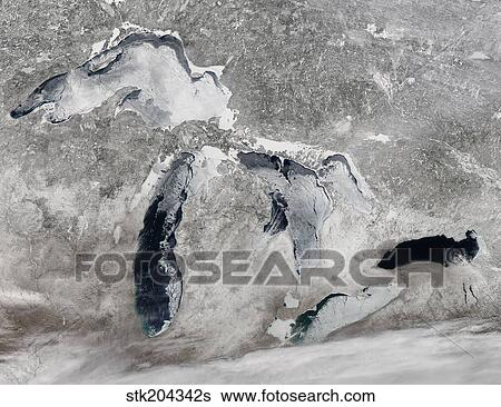 Stock Photograph - Satellite view of ice on the Great Lakes, United States.. Fotosearch