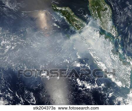 Satellite view of smoke and fires burning in Sumatra. View Large Photo Image Stock Photograph - Satellite view of smoke and fires burning in Sumatra.. Fotosearch