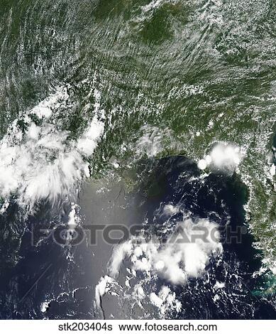 Satellite view of the Gulf of Mexico speckled and streaked with small clouds. View Large Photo Image Stock Photograph - Satellite view of the Gulf of Mexico speckled and streaked with small clouds.. Fotosearch