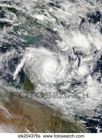 Satellite view of Tropical Cyclone Ita. View Large Photo Image Stock Photograph - Satellite view of Tropical Cyclone Ita.. Fotosearch
