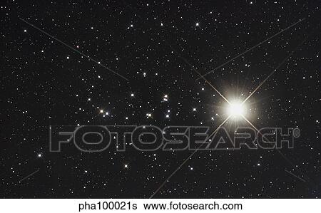Saturn in the Beehive Star Cluster View Large Photo Image Stock Photograph - Saturn in the Beehive Star Cluster. Fotosearch