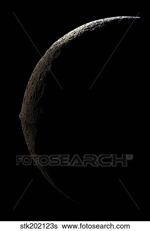 Saturn's moon Iapetus. View Large Photo Image Stock Photograph - Saturn's moon Iapetus.. Fotosearch