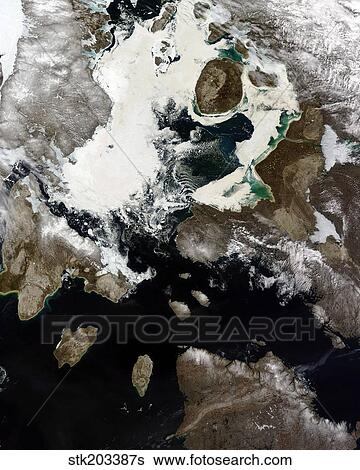 Stock Photograph - Sea ice and sediment visible in Nunavut, Canada.. Fotosearch