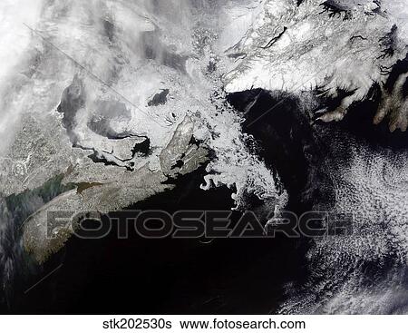 Sea ice fills the Gulf of St. Lawrence, giving the landscape a wintery appearance. View Large Photo Image Stock Photograph - Sea ice fills the Gulf of St. Lawrence, giving the landscape a wintery appearance.. Fotosearch