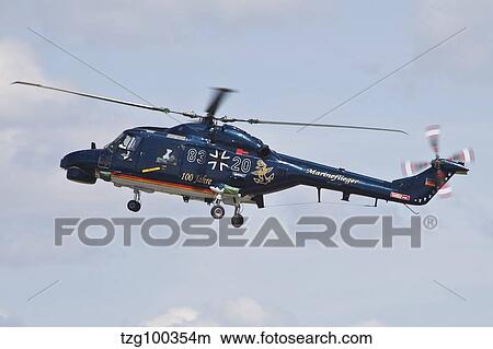 Picture - Sea Lynx helicopter of the German Navy with 100th anniversary markings.. Fotosearch