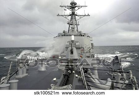 Sea spray whips across the deck of the USS Winston S. Churchill. View Large Photo Image Picture - Sea spray whips across the deck of the USS Winston S. Churchill.. Fotosearch