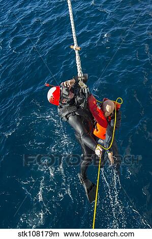 Seaman participates in a search and rescue drill. View Large Photo Image Picture - Seaman participates in a search and rescue drill.. Fotosearch
