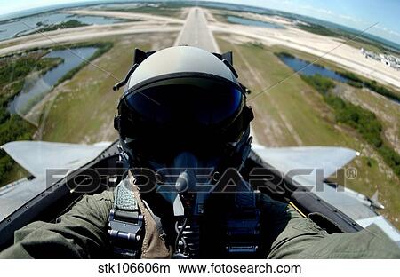 Self portrait of a pilot in the back seat of an F-15 during takeoff. View Large Photo Image Picture - Self portrait of a pilot in the back seat of an F-15 during takeoff.. Fotosearch