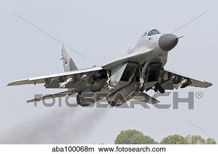 Serbian Air Force MiG-29 departing with two AA-8 Aphid missiles. View Large Photo Image Picture - Serbian Air Force MiG-29 departing with two AA-8 Aphid missiles.. Fotosearch