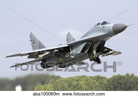Serbian Air Force MiG-29 departing with two AA-8 Aphid missiles. View Large Photo Image Picture - Serbian Air Force MiG-29 departing with two AA-8 Aphid missiles.. Fotosearch