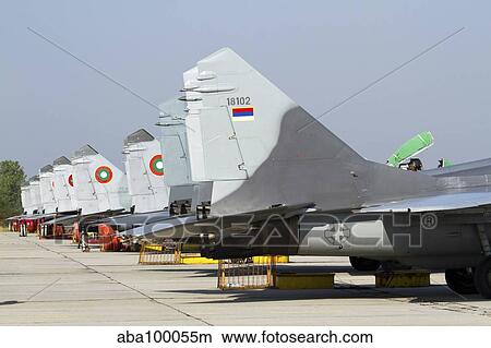 Serbian and Bulgarian MiG-29's parked at Graf Ignatievo Air Base. View Large Photo Image Picture - Serbian and Bulgarian MiG-29's parked at Graf Ignatievo Air Base.. Fotosearch