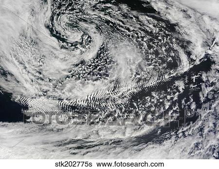 Ship-wave-shaped wave clouds induced by Aleutian Islands. View Large Photo Image Stock Photograph - Ship-wave-shaped wave clouds induced by Aleutian Islands.. Fotosearch