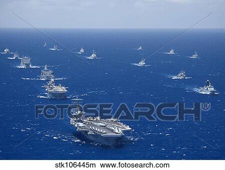 Ships and submarines participating in the Rim of the Pacific exercise. View Large Photo Image Picture - Ships and submarines participating in the Rim of the Pacific exercise.. Fotosearch