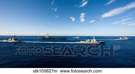Picture - Ships from the John C. Stennis Carrier Strike Group transit the Pacific Ocean.. Fotosearch
