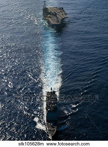 Ships from the John C. Stennis Carrier Strike Group transit the Pacific Ocean. View Large Photo Image Picture - Ships from the John C. Stennis Carrier Strike Group transit the Pacific Ocean.. Fotosearch