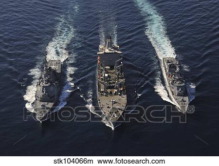 Ships of the George Washington Carrier Strike Group transit the Pacific Ocean. View Large Photo Image Picture - Ships of the George Washington Carrier Strike Group transit the Pacific Ocean.. Fotosearch