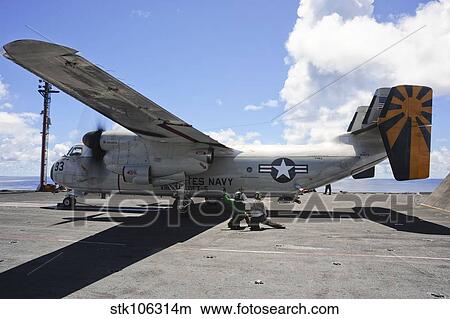 Shooters give the signal to launch a C-2A Greyhound aboard USS George Washington. View Large Photo Image Picture - Shooters give the signal to launch a C-2A Greyhound aboard USS George Washington.. Fotosearch