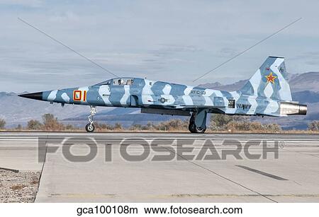 Side view of a F-5E Freedom Fighter aircraft. View Large Photo Image Picture - Side view of a F-5E Freedom Fighter aircraft.. Fotosearch