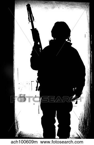 Silhouette of a British soldier in a doorway at Camp Condor, Iraq. View Large Photo Image Picture - Silhouette of a British soldier in a doorway at Camp Condor, Iraq.. Fotosearch