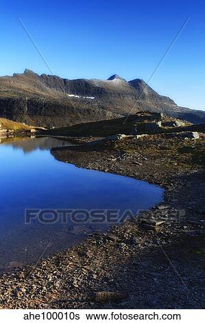 Skittendalen mountain peaks in Troms County, Norway. View Large Photo Image Stock Photograph - Skittendalen mountain peaks in Troms County, Norway.. Fotosearch