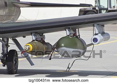 Slovenian PC-9M with bombs equipped. View Large Photo Image Picture - Slovenian PC-9M with bombs equipped.. Fotosearch