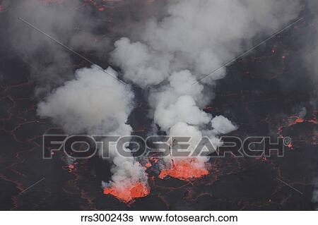 Stock Photograph - Small fountains in lava lake, Nyiragongo Volcano, Democratic Republic of the Congo.. Fotosearch