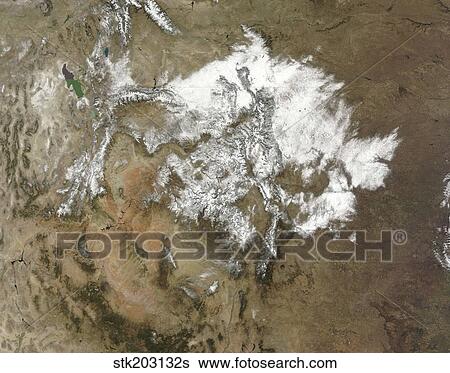 Snow covers the Rocky Mountains in the western United States. View Large Photo Image Stock Photograph - Snow covers the Rocky Mountains in the western United States.. Fotosearch