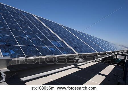 Solar panels installed on top of a parking garage. View Large Photo Image Picture - Solar panels installed on top of a parking garage.. Fotosearch