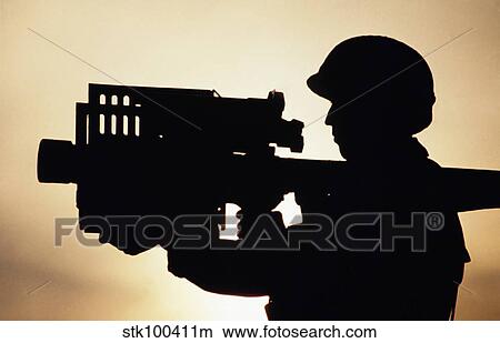 Picture - Soldier Holds a Stinger Anti-Aircraft Guided Missile. Fotosearch
