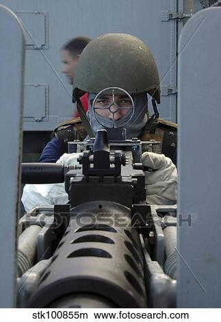Picture - Soldier mans a. 50 caliber machine gun mount.. Fotosearch
