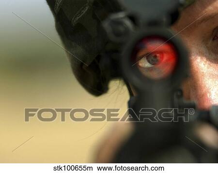 Soldier sights in on pop up targets. View Large Photo Image Picture - Soldier sights in on pop up targets.. Fotosearch