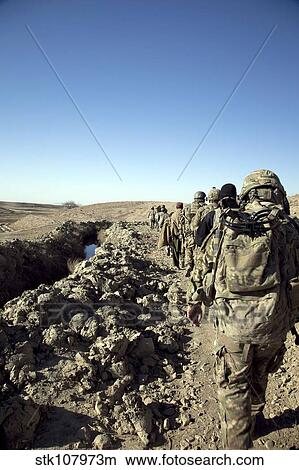 Soldiers conduct a census to better understand the locals in Kandahar, Afghanistan. View Large Photo Image Picture - Soldiers conduct a census to better understand the locals in Kandahar, Afghanistan.. Fotosearch