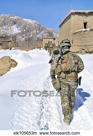 Soldiers conduct a patrol in Shah Joy district, Zabul province, Afghanistan. View Large Photo Image Picture - Soldiers conduct a patrol in Shah Joy district, Zabul province, Afghanistan.. Fotosearch