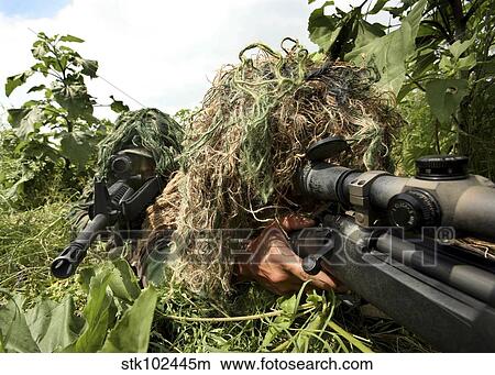 Soldiers dressed in ghillie suits. View Large Photo Image Picture - Soldiers dressed in ghillie suits.. Fotosearch