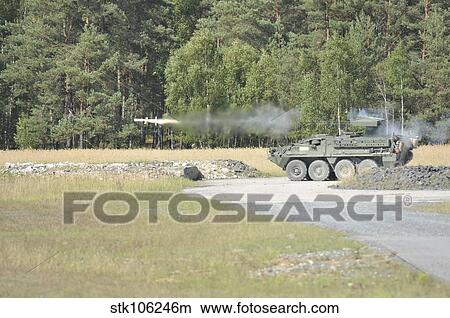 Soldiers fire a TOW missile at Grafenwoehr training area. View Large Photo Image Picture - Soldiers fire a TOW missile at Grafenwoehr training area.. Fotosearch