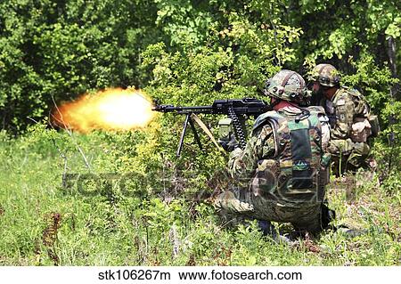 Soldiers from the Croatian Army return fire during Immediate Response 2012. View Large Photo Image Picture - Soldiers from the Croatian Army return fire during Immediate Response 2012.. Fotosearch