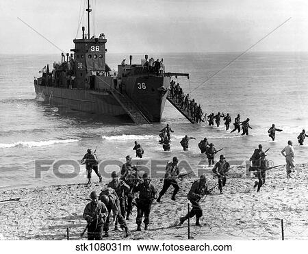 Soldiers of the U. S. Army invade the beach during Operation Torch in North Africa. View Large Photo Image Picture - Soldiers of the U. S. Army invade the beach during Operation Torch in North Africa.. Fotosearch