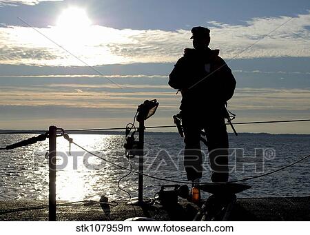 Sonar Technician stands sentry aboard attack submarine USS Annapolis. View Large Photo Image Picture - Sonar Technician stands sentry aboard attack submarine USS Annapolis.. Fotosearch